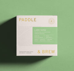 Bag of Lark Song light-medium roast coffee beans from Dominican Republic. Honey Processed, Chocolate and Sugarcane notes.